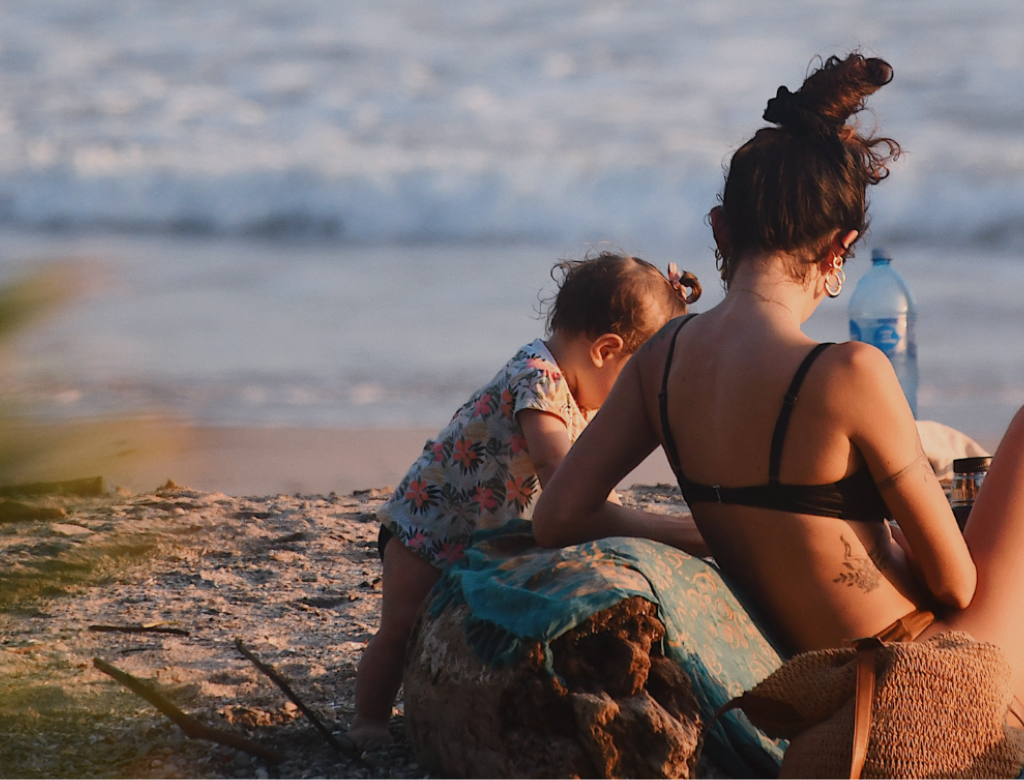 Traveler relaxing on a quiet Santa Teresa beach during Costa Rica’s low season.